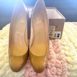 Christian Loubutin 3 inch heels with shiny tan color, size 8m